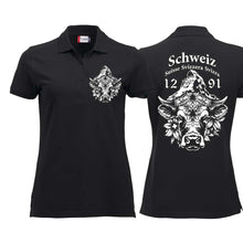 Lade das Bild in den Galerie-Viewer, Polo Damen Schwarz mit Schweizer Kuh vor dem Matterhorn und Text Schweiz Suisse Svizzera Svizra 1291