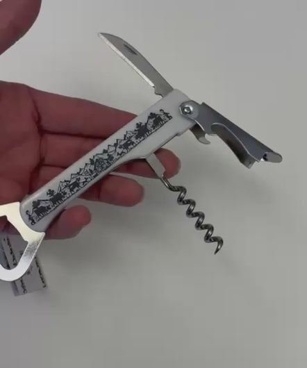 Flaschen-/Dosenöffner mit Messer im Scherenschnittdesign