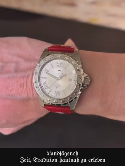 Folklore Armbanduhren mit Edelweiss und Kuh Motiven.