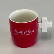 Load and play video in Gallery viewer, Ceramic mug with Swiss cross handle
