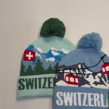 Charger et lire la vidéo dans la visionneuse de la Galerie, Bonnet tricoté « Switzerland » avec des motifs suisses
